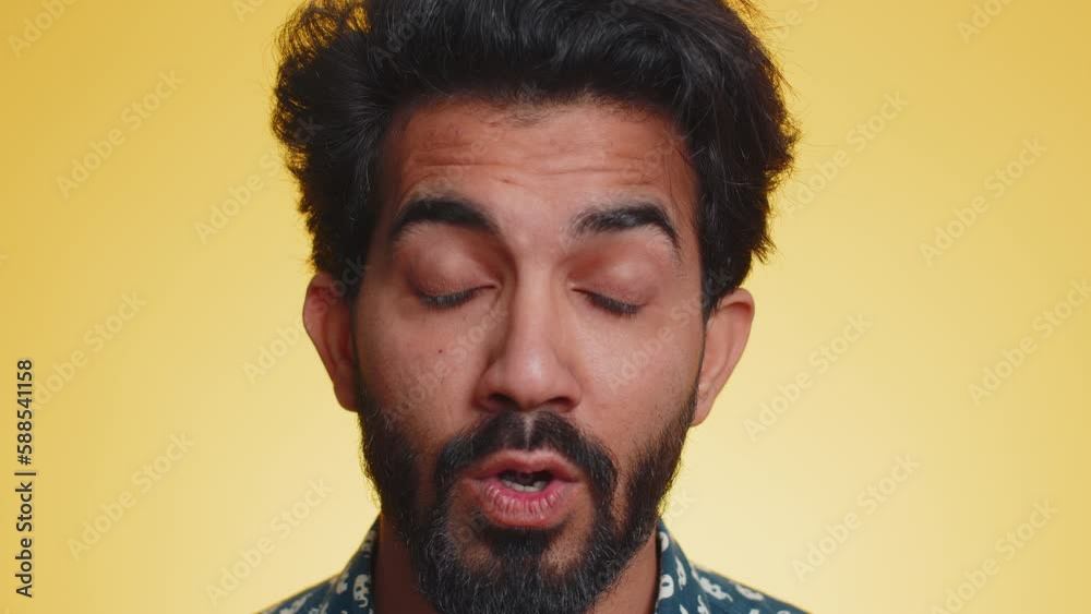 Oh my God, Wow. Excited amazed winner man surprise looking at camera with big eyes, shocked by sudden victory. Sincere confused shocked handsome indian guy isolated alone on yellow studio background Oh my God, Wow. Excited amazed winner man surprise looking at camera with big eyes, shocked by sudden victory. Sincere confused shocked handsome indian guy isolated alone on yellow studio background
