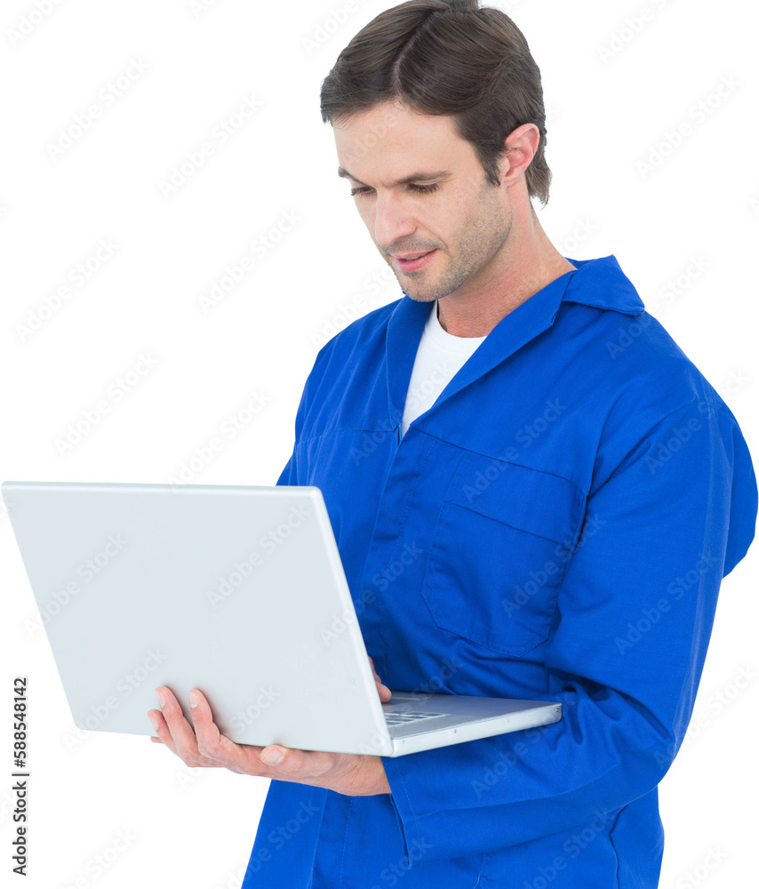 Mechanic using laptop over white background Mechanic using laptop over white background