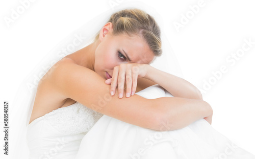Upset young bride against white background