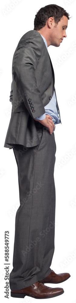 Serious businessman with hands on hips