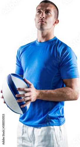Sports player looking away while holding ball