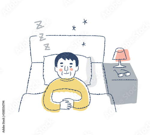 ベッドで眠るシニア男性