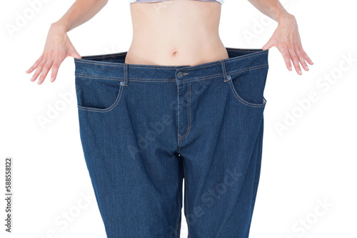 Woman wearing too large pants  photo