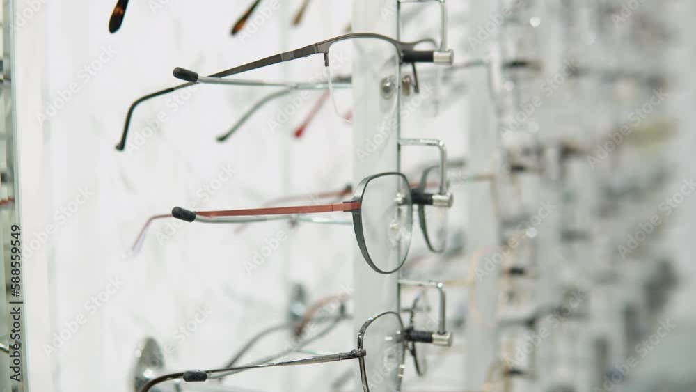 Showcase with glasses in modern optic store Showcase with glasses in modern optic store