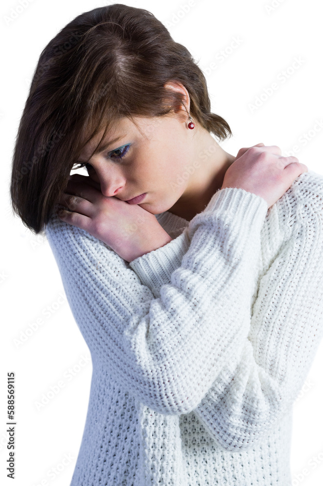 Sad pretty brunette thinking with arms crossed Sad pretty brunette thinking with arms crossed
