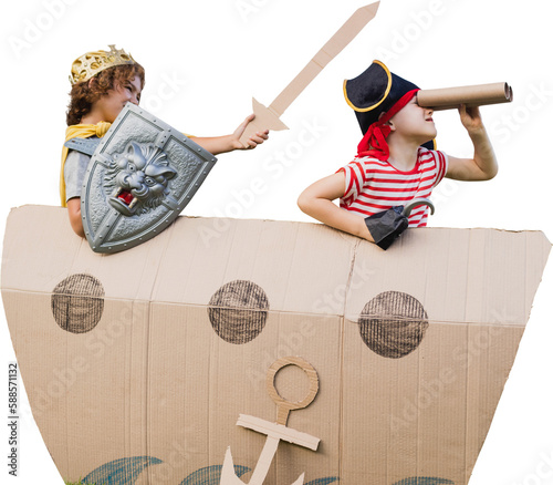 Boys in pirate costumes with artificial cardboard ship