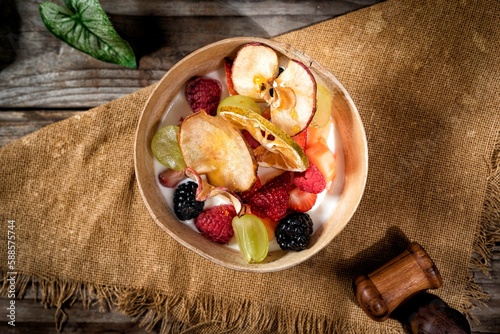 Bowl with apple, grape,raspberry and melon