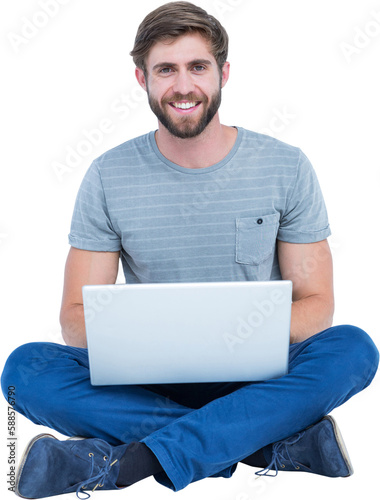 Portrait of happy young man with laptop 
