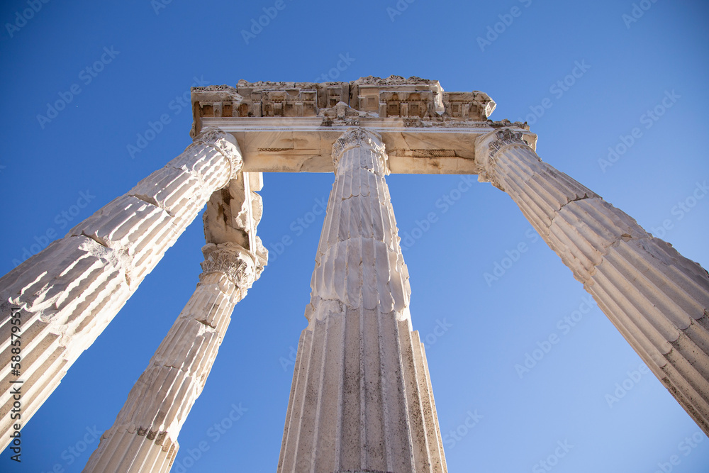Ancient Ruins of Pergamon Acropolis. Ancient city column ruins with the blue sky in the background. Close-up.