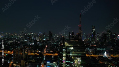 Wallpaper Mural night illumination bangkok city downtown traffic modern building glass front aerial panorama 4k thailand Torontodigital.ca