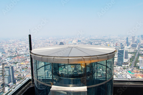 Photography Roof of hydraulic Glass Lift or Elevator (capsule lift) on the top of King Power MahaNakhon skyscraper, it operates between the 74th floor Indoor and 78th floor Outdoor 360-degree Observation Decks