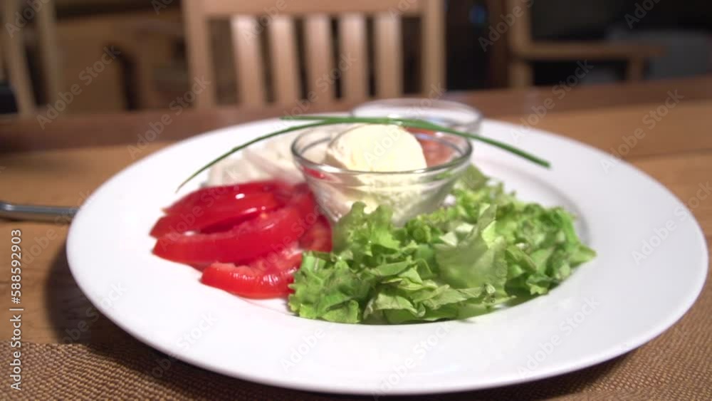 Slow revealing shot of the hors d'oeuvres served with a meal in a restaurant Slow revealing shot of the hors d'oeuvres served with a meal in a restaurant