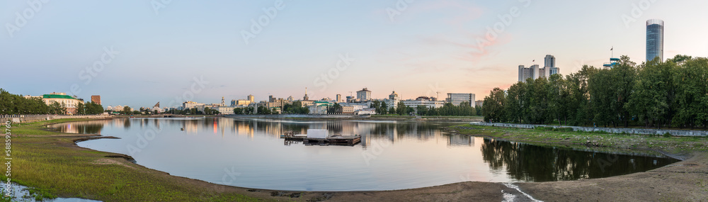 Sunset on a pond in the center of the city. Yekaterinburg, Russia