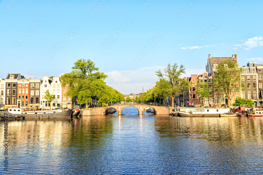 Amsterdam, Netherlands - June 30, 2019 Canal (street) Keizersgracht is connected to Amstel. Bridge.The historic city center