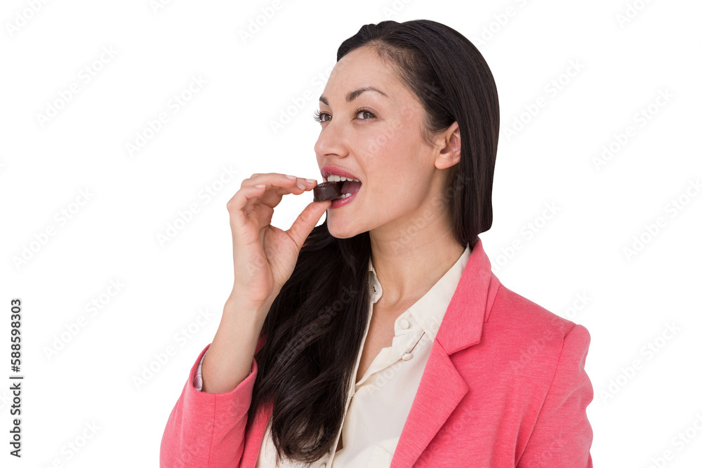 Smiling brunette eating chocolate Smiling brunette eating chocolate
