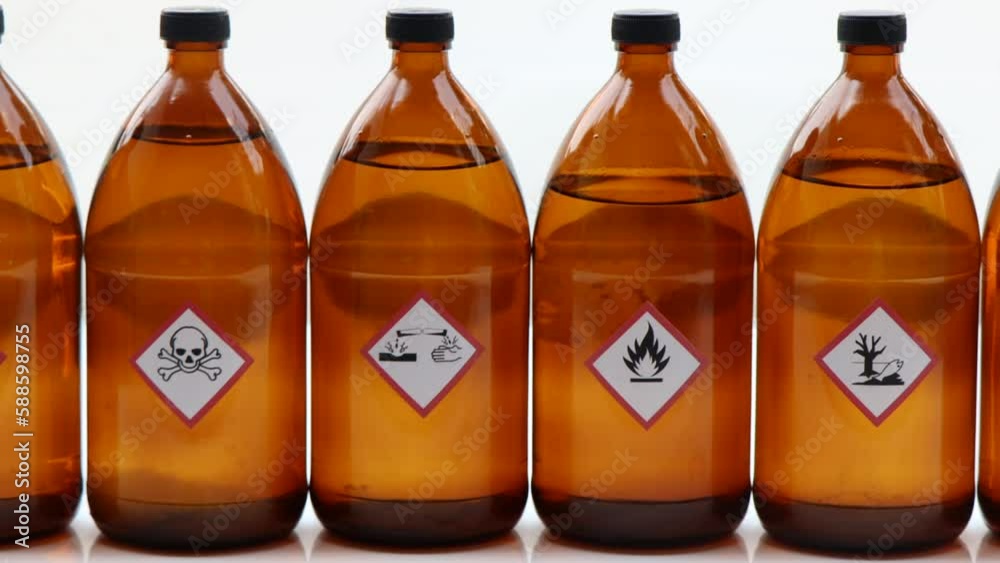 Warning symbol for chemical hazard on chemical container, chemical in laboratory and industry 