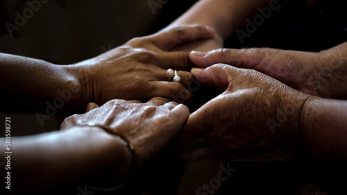 Praying hands together at Church.