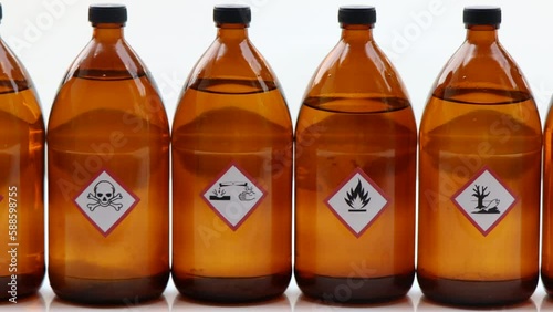 Warning symbol for chemical hazard on chemical container, chemical in laboratory and industry 