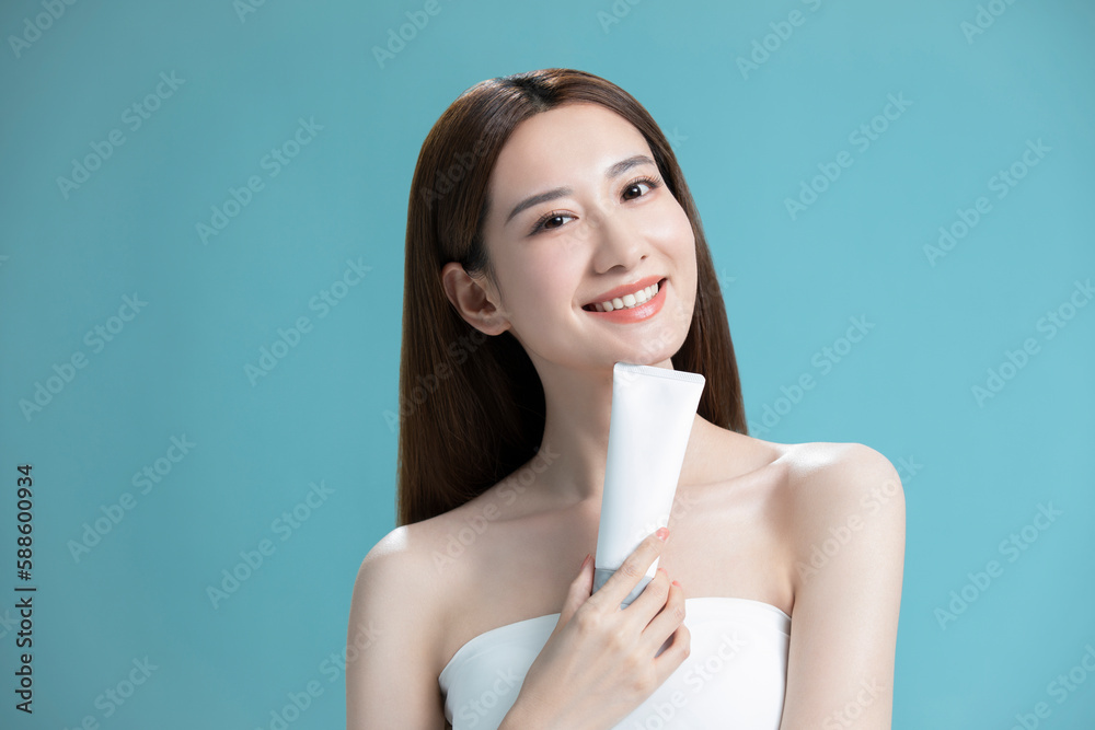 Beautiful young Chinese woman with face wash Beautiful young Chinese woman with face wash