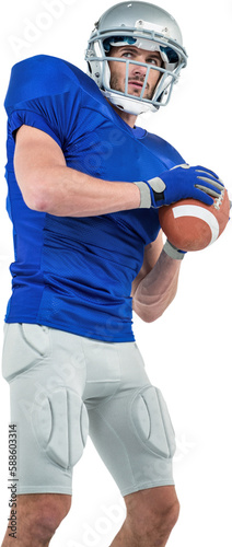 Confident American football player throwing the ball