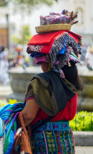 Entrepreneur woman selling handicrafts in Antigua Guatemala park 