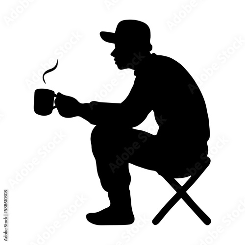 Man sitting and drinking hot coffee, Person silhouette sitting in camp chair.