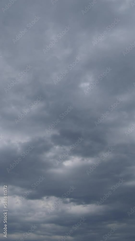Cloudy sky before storm vertical video time lapse on a cloudy day. Cloudy sky before storm vertical video time lapse on a cloudy day.