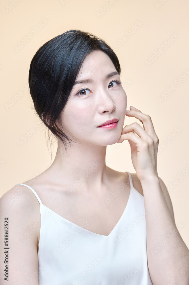 Photo of girl with flawless skin on Yellow background. Skin care and beauty concept Photo of girl with flawless skin on Yellow background. Skin care and beauty concept