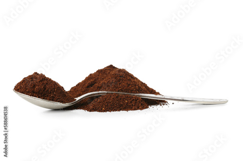 Pile of coffee powder and spoon isolated on white background