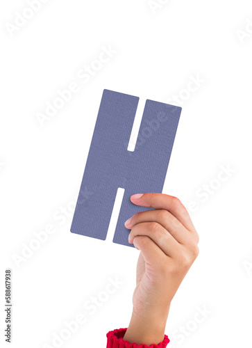 Person holding purple H sign