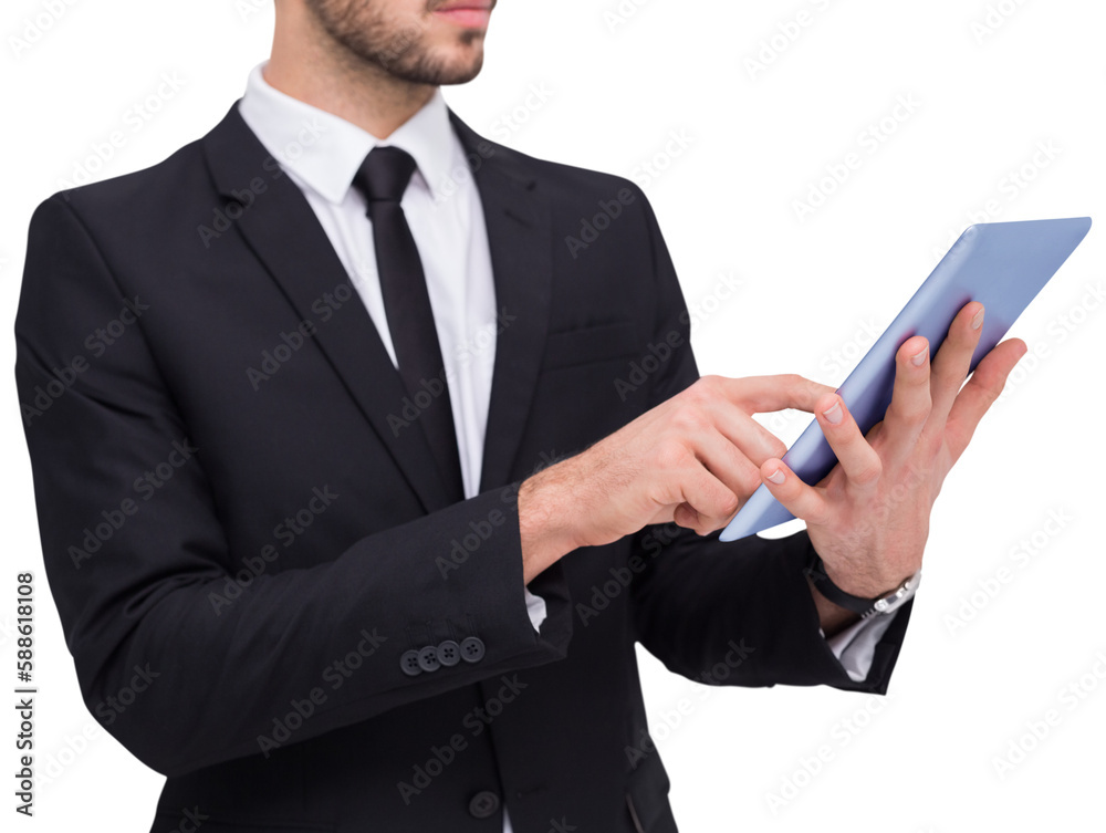 Mid section of a businessman using digital tablet pc Mid section of a businessman using digital tablet pc