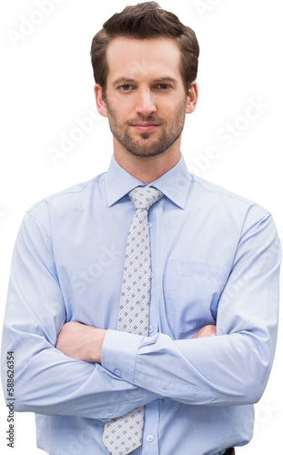 Serious manager with arms crossed in warehouse