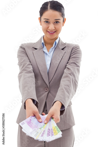 Portrait of a businesswoman showing bank notes
