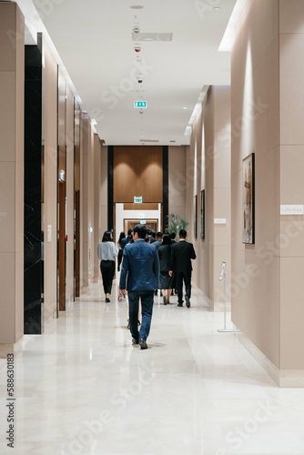 businessman walking down the corridor