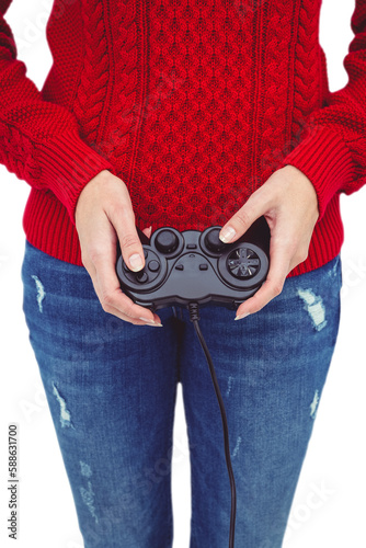 Mid section of a hipster woman playing video games