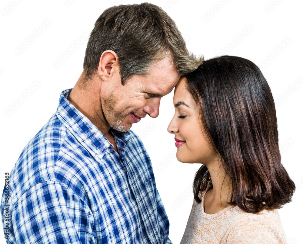 Close-up of romantic couple standing face to face Close-up of romantic couple standing face to face