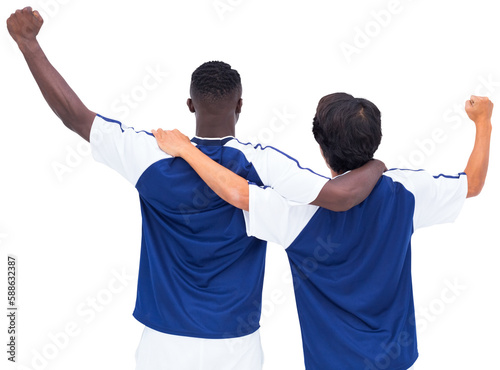 Rear view of two football players rejoicing