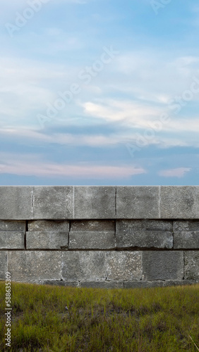 Barrier wall on meadow field