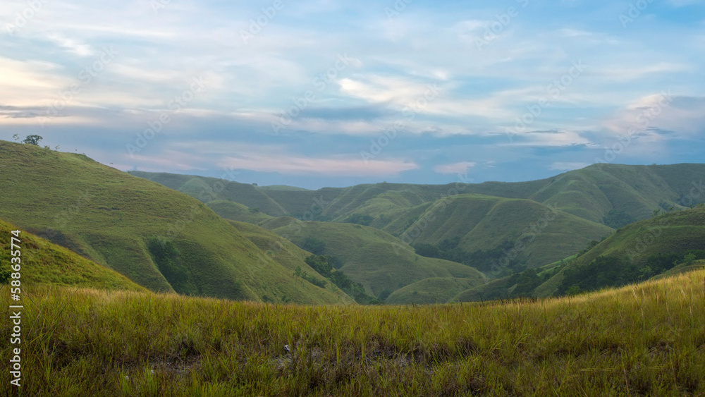 Green hills with a landscape view Green hills with a landscape view