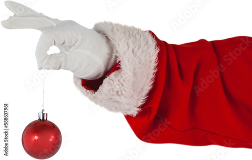 Santa Claus holding Christmas ornament