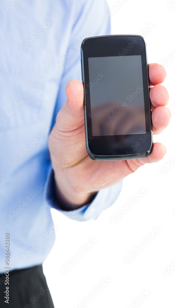 Businessman showing his smartphone to camera Businessman showing his smartphone to camera