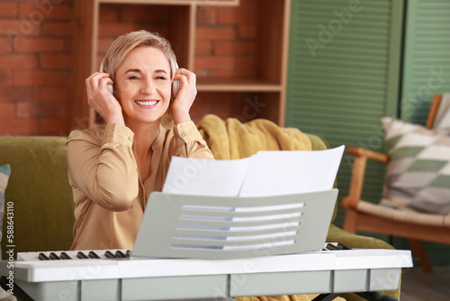 Mature female musician with...