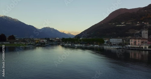 Wallpaper Mural Lake Iseo with Pisogne village townscape at dusk, flying above water Torontodigital.ca