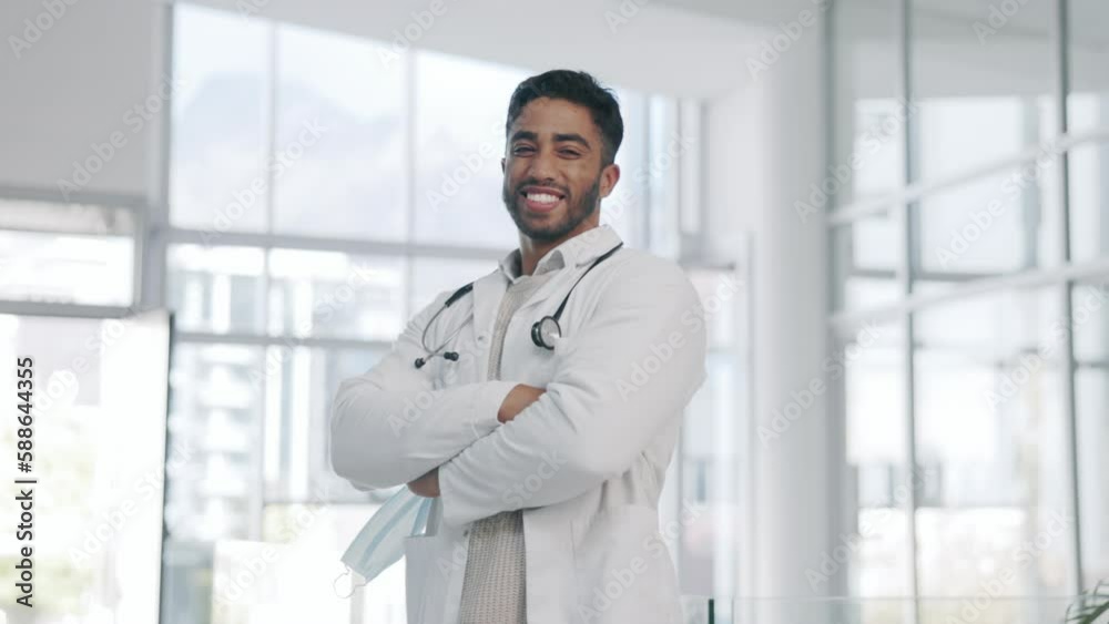 Face, man and doctor remove mask, healthcare and regulations for virus, disease and smile. Portrait, male employee and medical professional with happiness, arms crossed and breakthrough in hospital Face, man and doctor remove mask, healthcare and regulations for virus, disease and smile. Portrait, male employee and medical professional with happiness, arms crossed and breakthrough in hospital