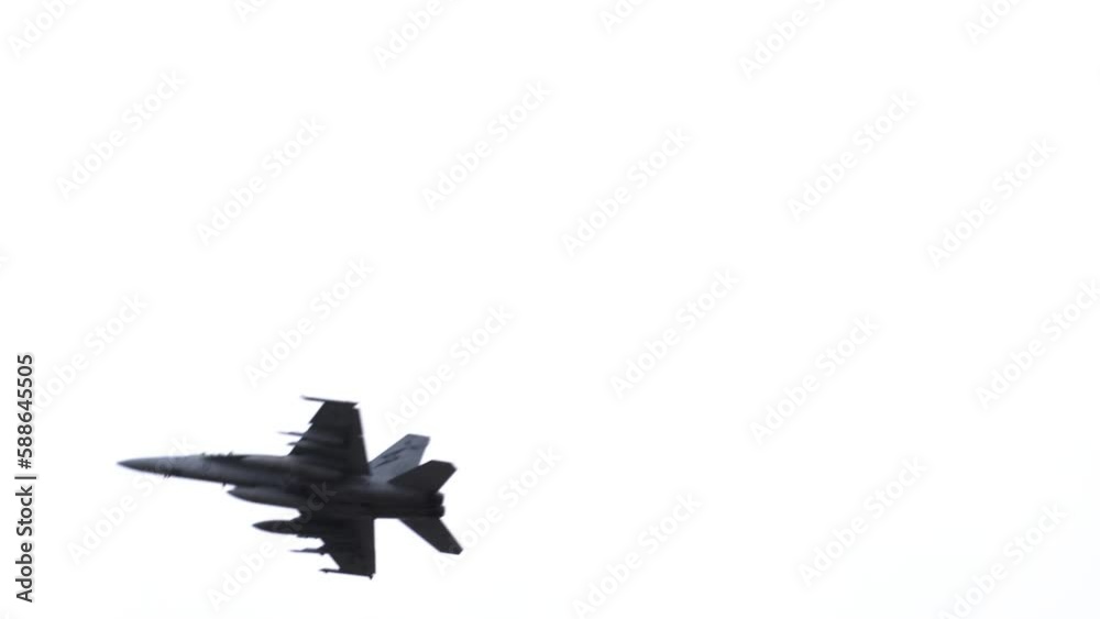 Boeing EA-18G Growler Flying In Cloudy Sky - low angle Boeing EA-18G Growler Flying In Cloudy Sky - low angle