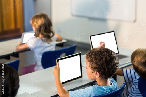Students using digital tablet 