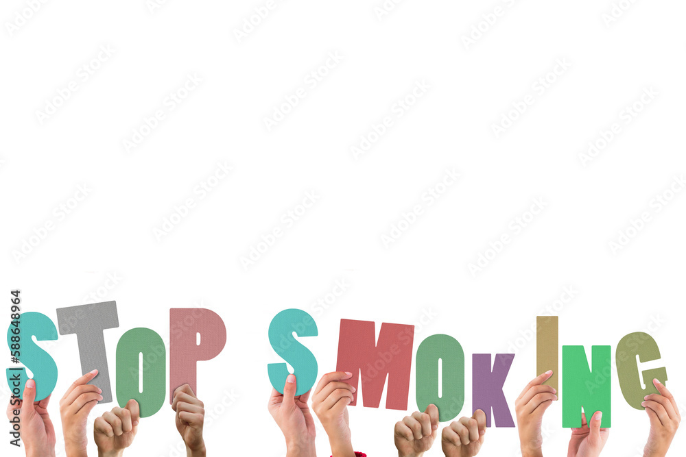 Colorful alphabet spelling stop smoking held up by people Colorful alphabet spelling stop smoking held up by people