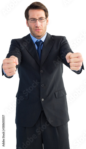 Businessman standing with clenched fists