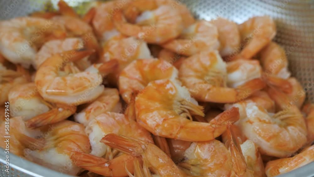 Close up of Fresh raw peeled prawns or shrimps. Seafood background slow motion Close up of Fresh raw peeled prawns or shrimps. Seafood background slow motion