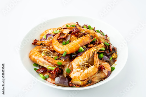 A plate of spicy shrimp on a white background